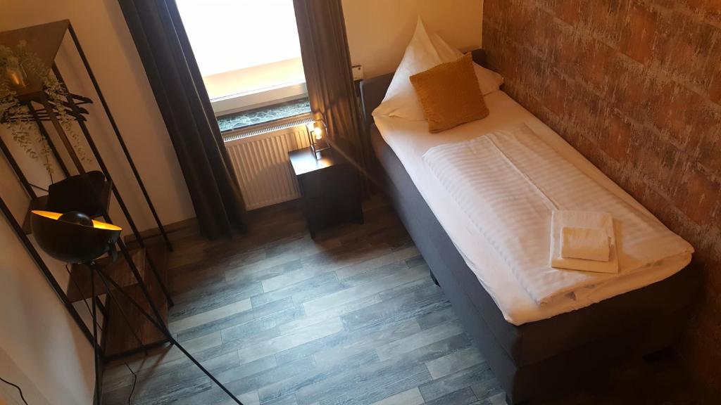 Postel nebo postele na pokoji v ubytování Pension Abshoff