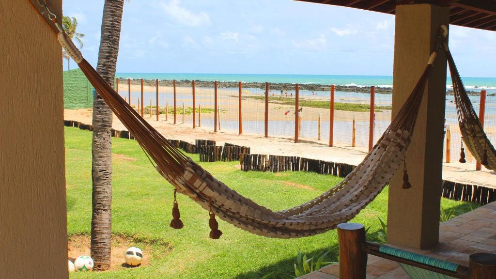  Aconchegante vila pé na areia em Búzios por Carpediem
