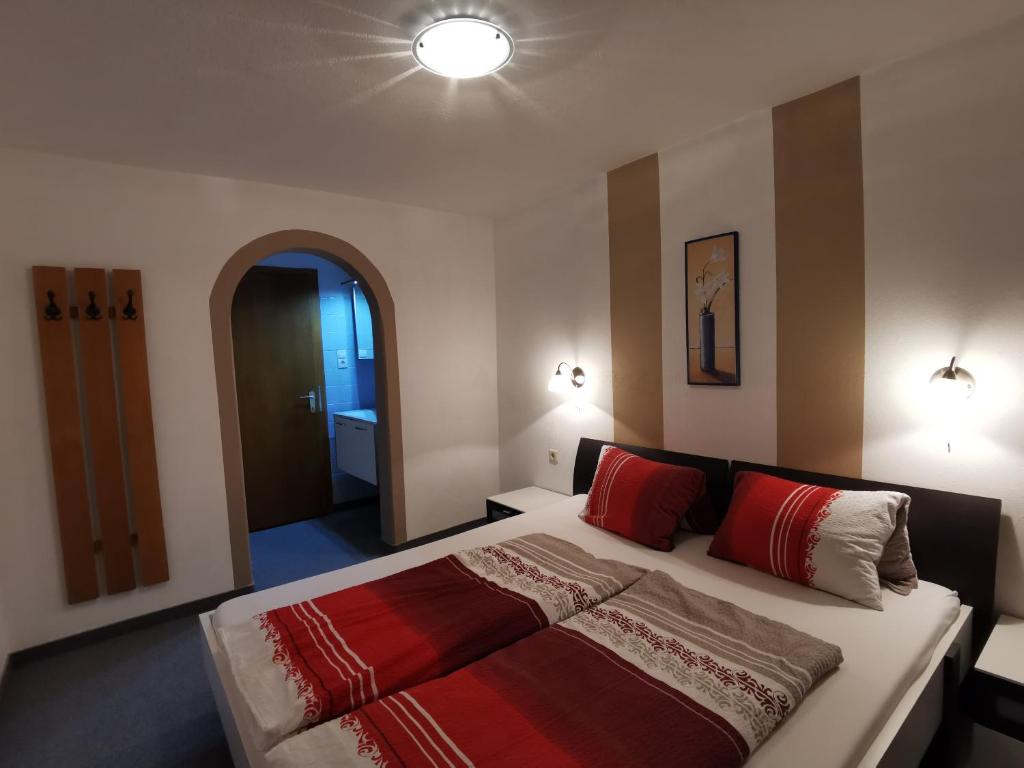 Postel nebo postele na pokoji v ubytování Jogglerhof
