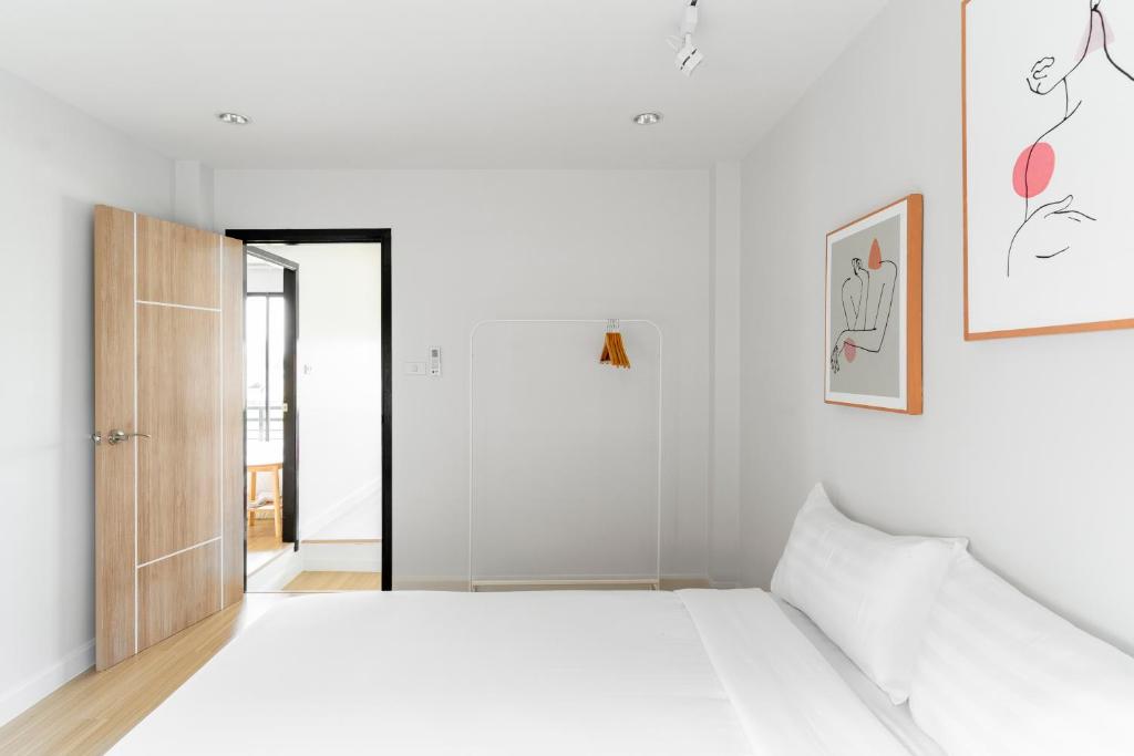 Postel nebo postele na pokoji v ubytování Brand-new Aewmai Pool Villa&Promotion◆byน้องมังคุด