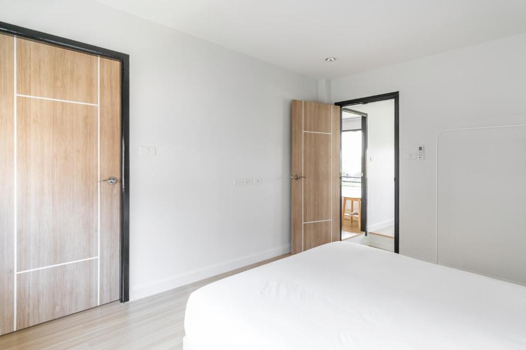 Postel nebo postele na pokoji v ubytování Brand-new Aewmai Pool Villa&Promotion◆byน้องมังคุด