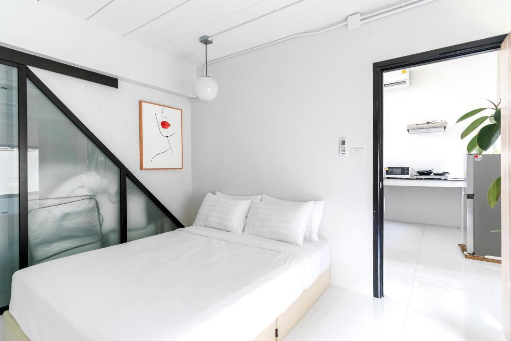 Postel nebo postele na pokoji v ubytování Brand-new Aewmai Pool Villa&Promotion◆byน้องมังคุด