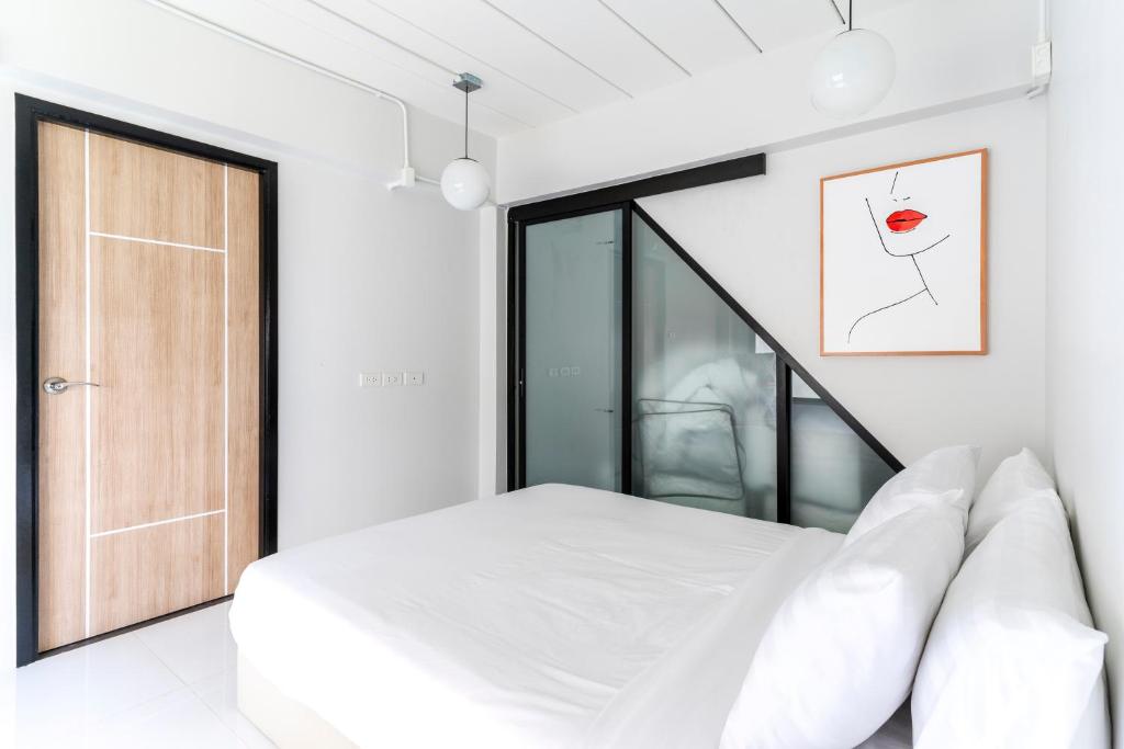 Postel nebo postele na pokoji v ubytování Brand-new Aewmai Pool Villa&Promotion◆byน้องมังคุด