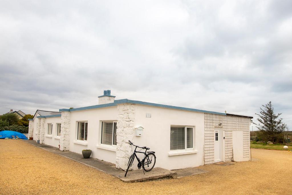 Фото Beachcomber Cottages