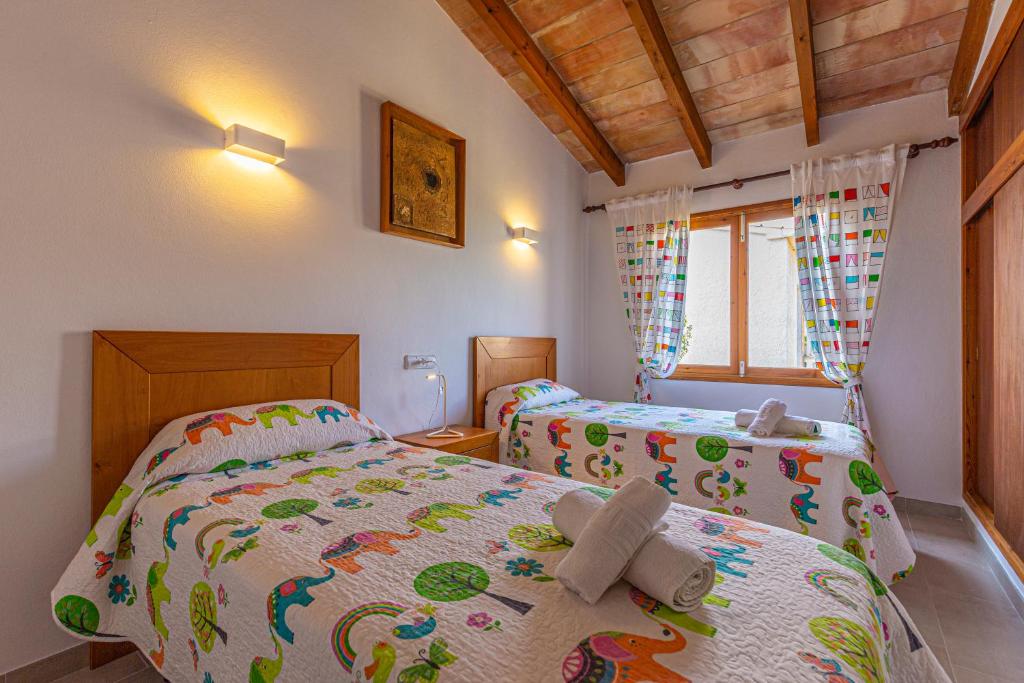 Postel nebo postele na pokoji v ubytování Villa Rosers