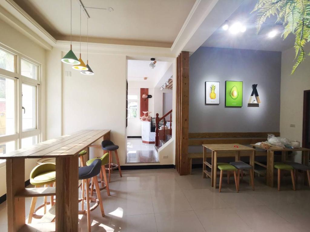 Postel nebo postele na pokoji v ubytování 漫時光 旅空間 ManLu INN