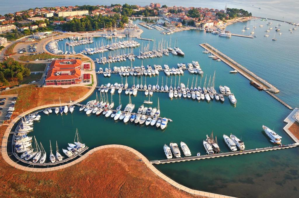 an aerial view of a marina with boats in the water at Apartments Nautica II in Novigrad Istria