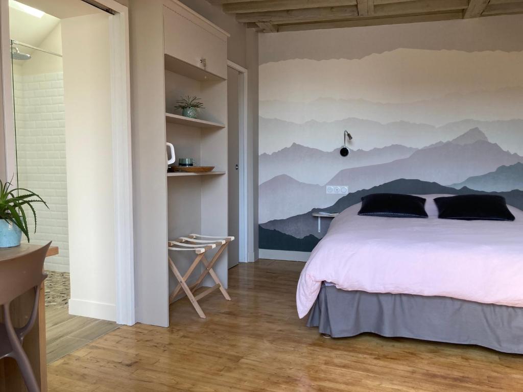 Postel nebo postele na pokoji v ubytování Chambres chez l'habitant Capucine