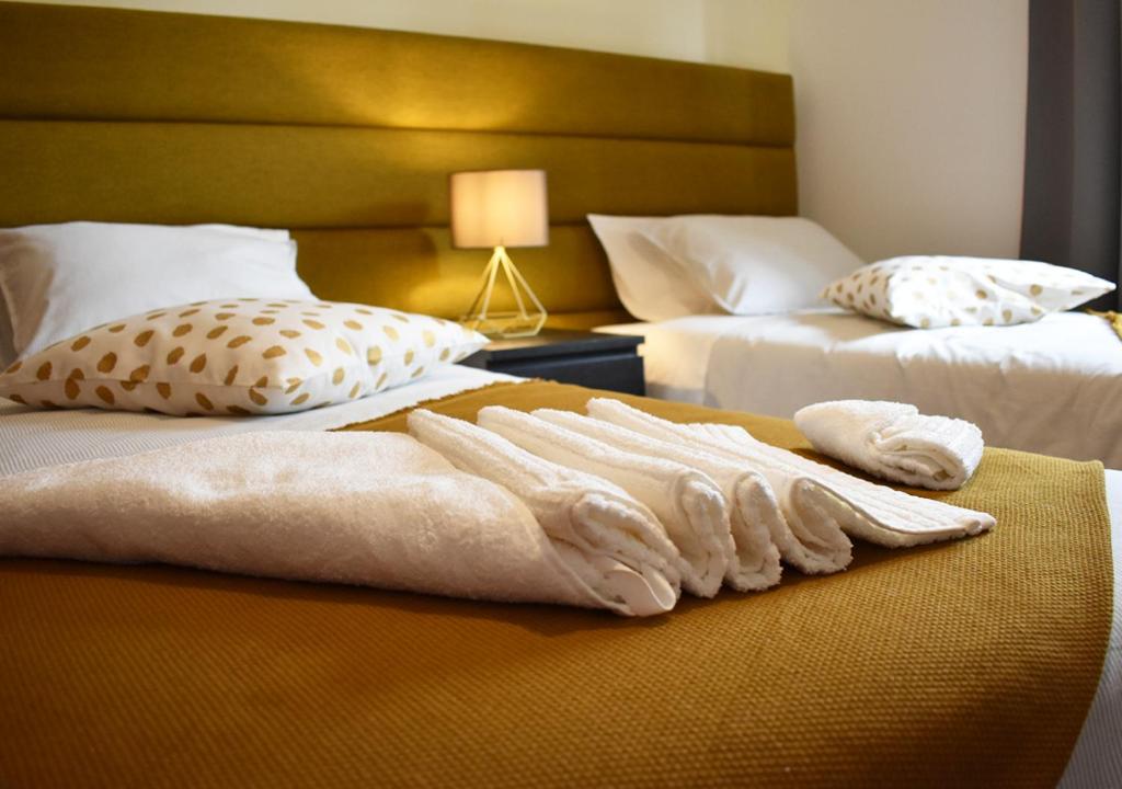 Llit o llits en una habitació de Batalhoz House