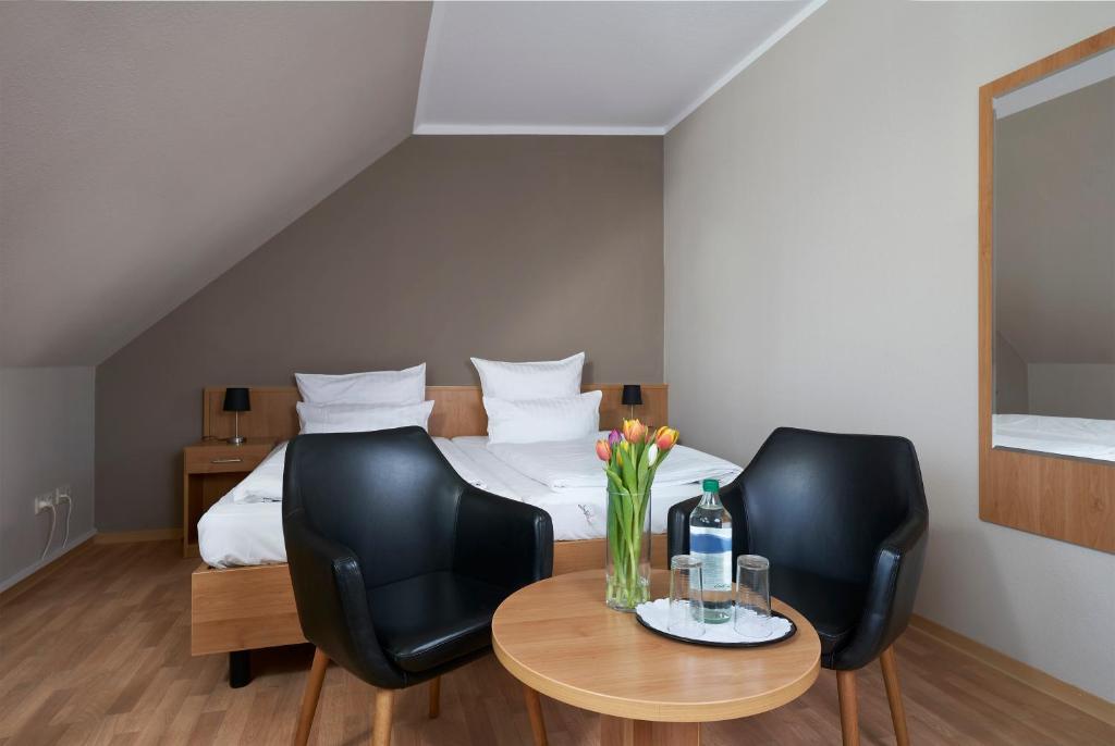 Postel nebo postele na pokoji v ubytování Hotel Marco Polo
