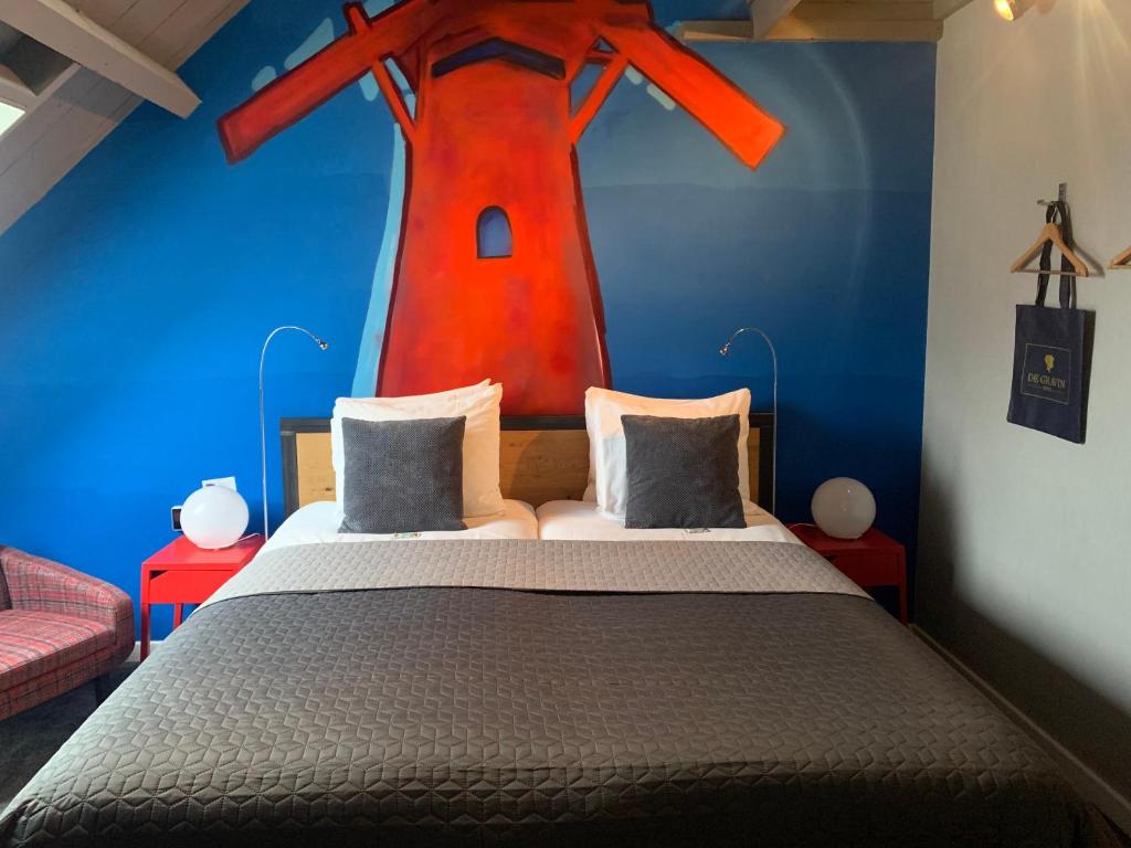 Postel nebo postele na pokoji v ubytování Hotel De Gravin