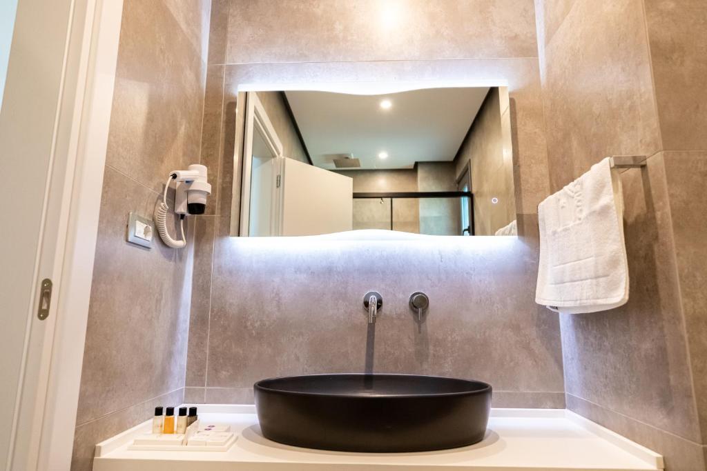 Koupelna v ubytování Ames Hotel & SPA