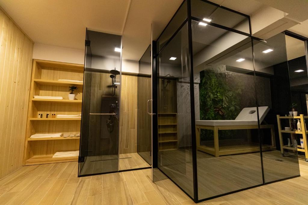 Postel nebo postele na pokoji v ubytování Ames Hotel & SPA