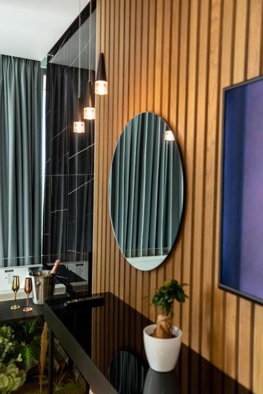 TV a/nebo společenská místnost v ubytování Ames Hotel & SPA