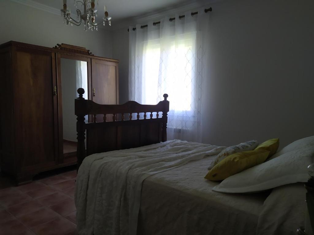 Postel nebo postele na pokoji v ubytování O abeiro de Buscalte