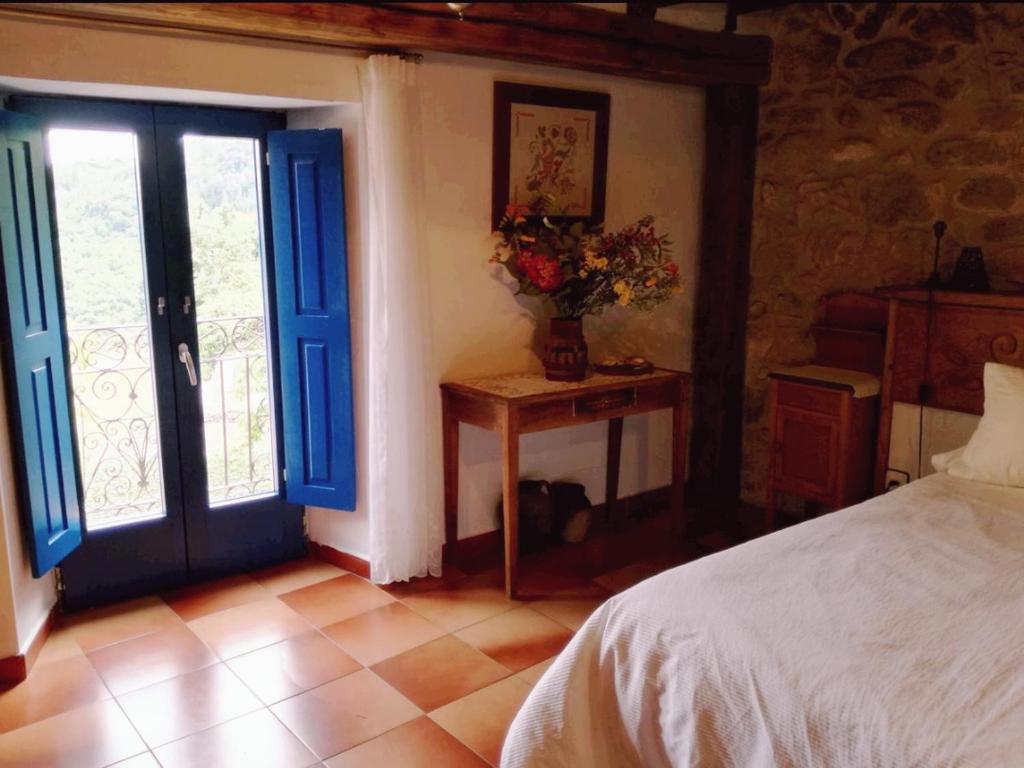 Postel nebo postele na pokoji v ubytování Casa Lucia