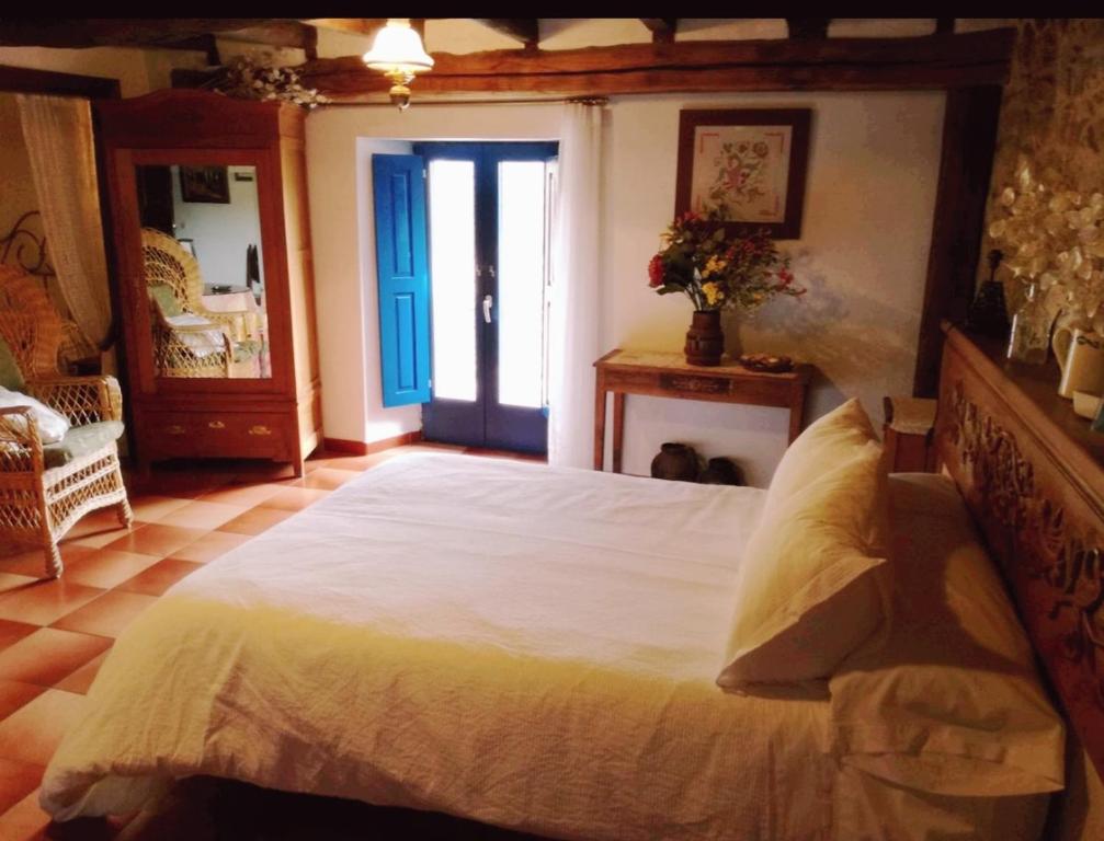 Postel nebo postele na pokoji v ubytování Casa Lucia
