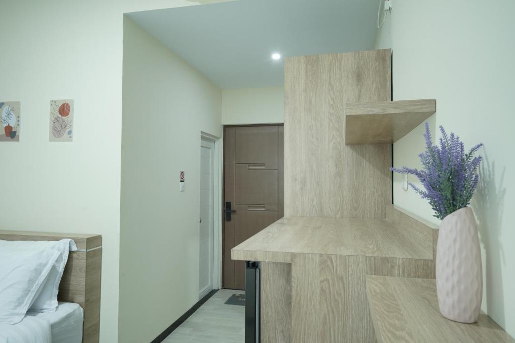 Postel nebo postele na pokoji v ubytování CASAKITA exclusive guest house