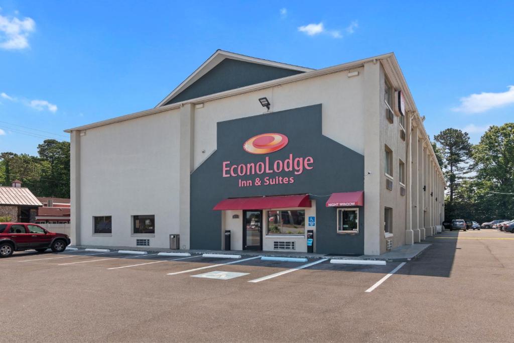 a building with a large sign on the side of it at Econo Lodge Inn & Suites I-64 & US 13 in Virginia Beach