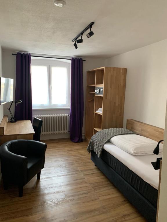 Postel nebo postele na pokoji v ubytování Brauereigasthof Bären
