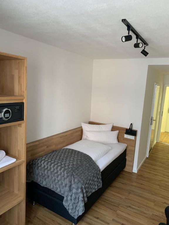 Postel nebo postele na pokoji v ubytování Brauereigasthof Bären