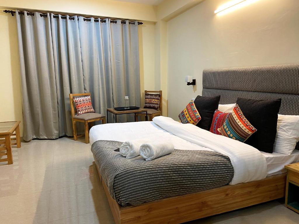 Postel nebo postele na pokoji v ubytování Getaway Stays Manali