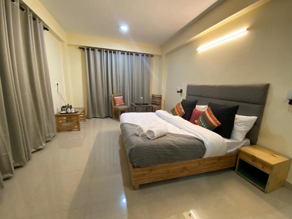 Postel nebo postele na pokoji v ubytování Getaway Stays Manali