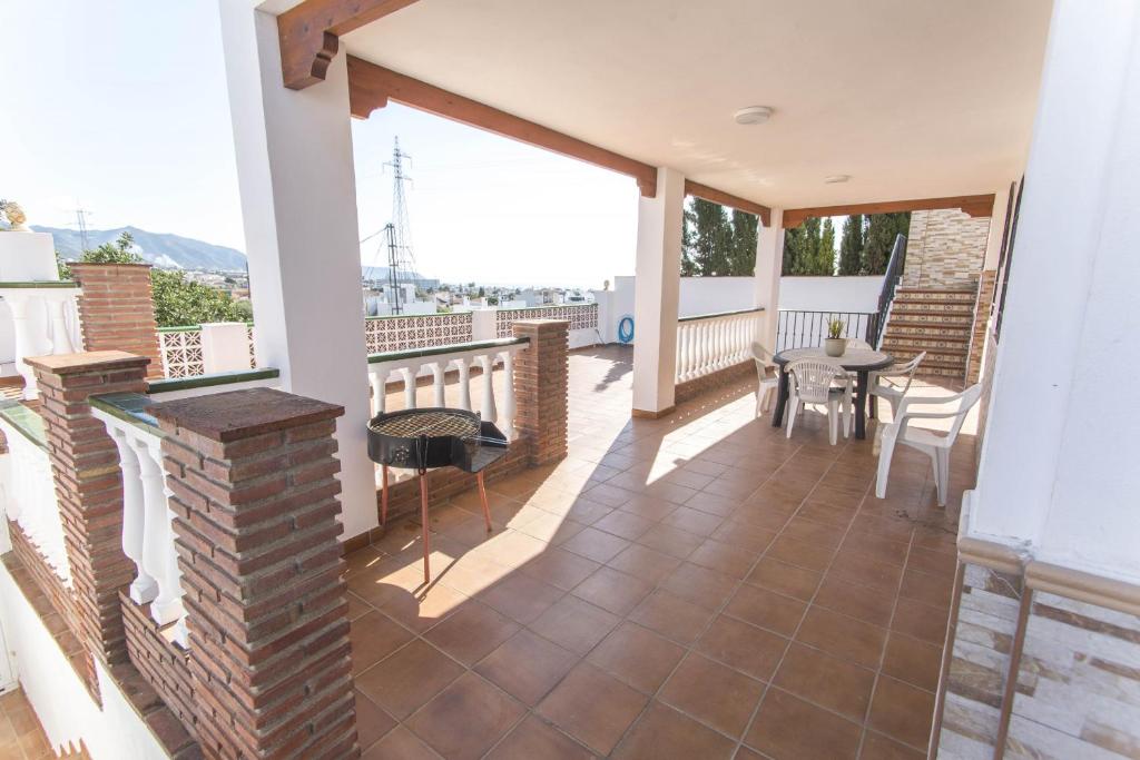 A balcony or terrace at Villa Vallao Nerja