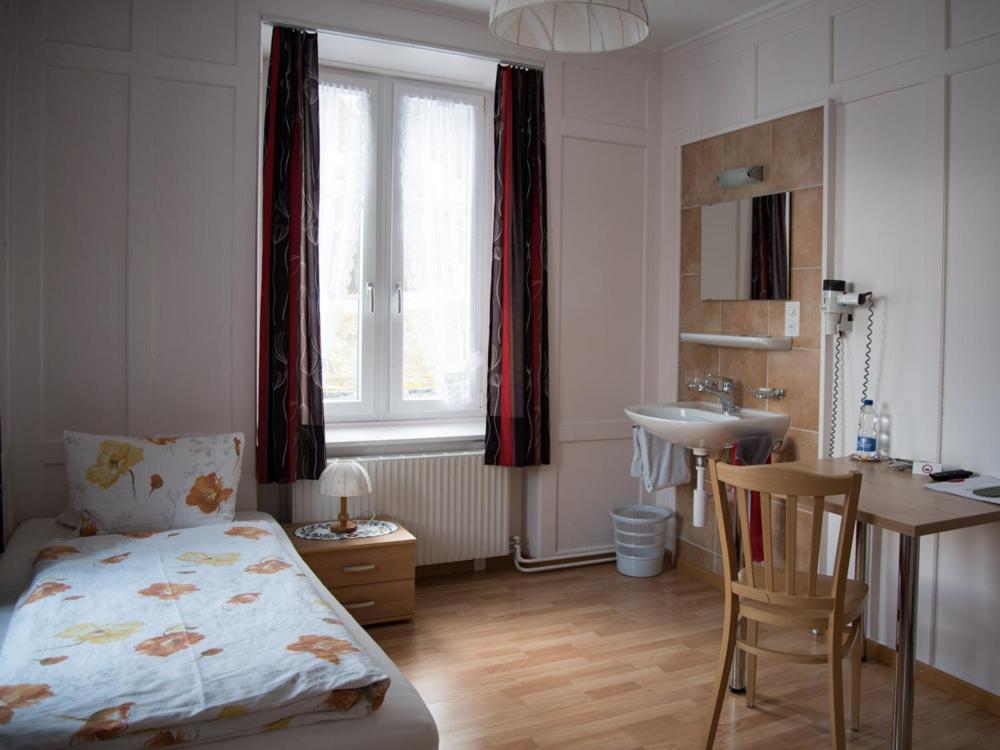 Postel nebo postele na pokoji v ubytování Hotel Restaurant Raben