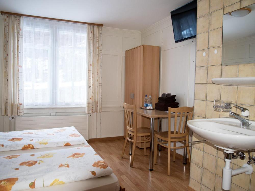Postel nebo postele na pokoji v ubytování Hotel Restaurant Raben