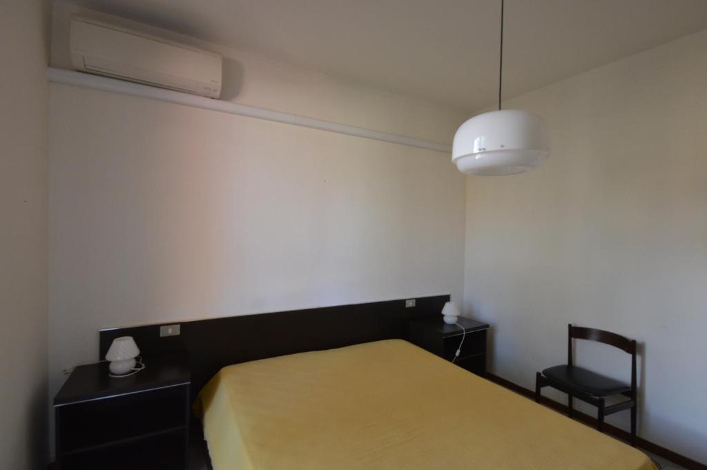 Postel nebo postele na pokoji v ubytování Casavacanze Zeus