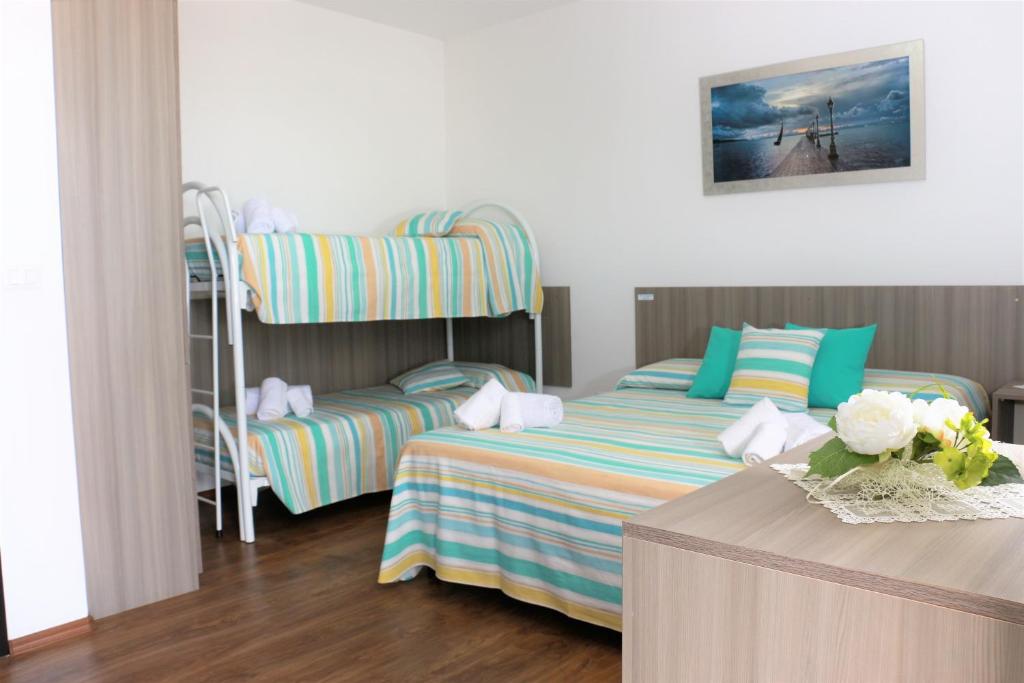 Postel nebo postele na pokoji v ubytování B&B Incanto Salento