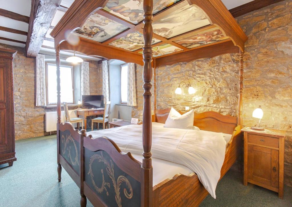 Postel nebo postele na pokoji v ubytování Hotel Meisnerhof