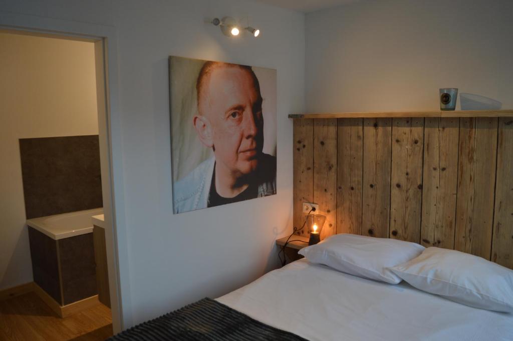 Postel nebo postele na pokoji v ubytování Luxury Spa Hotel - Francofolies