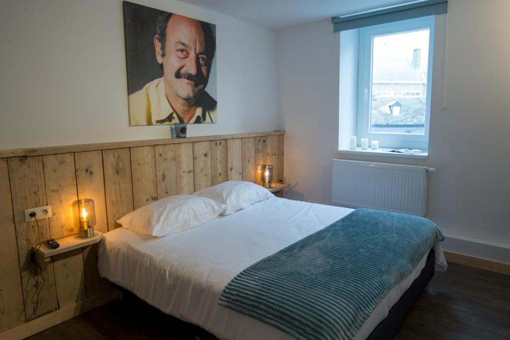 Postel nebo postele na pokoji v ubytování Luxury Spa Hotel - Francofolies