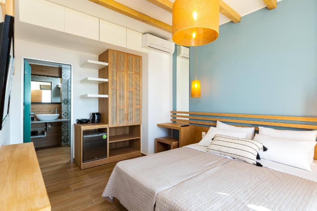 Postel nebo postele na pokoji v ubytování Villa Theano