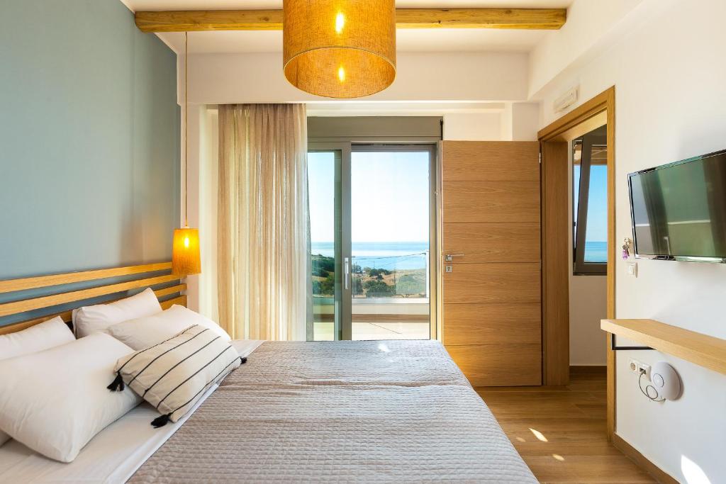 Postel nebo postele na pokoji v ubytování Villa Theano