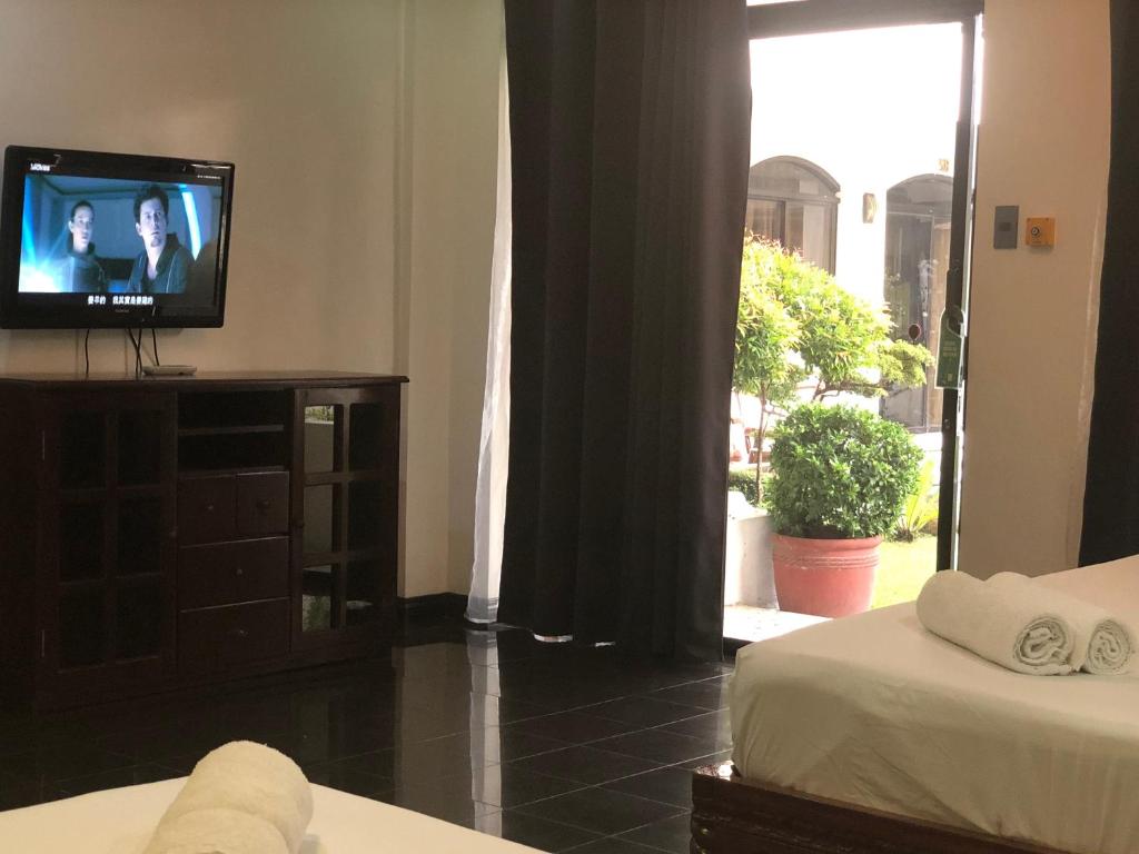 Postel nebo postele na pokoji v ubytování Ettamogah Hotel Inc.