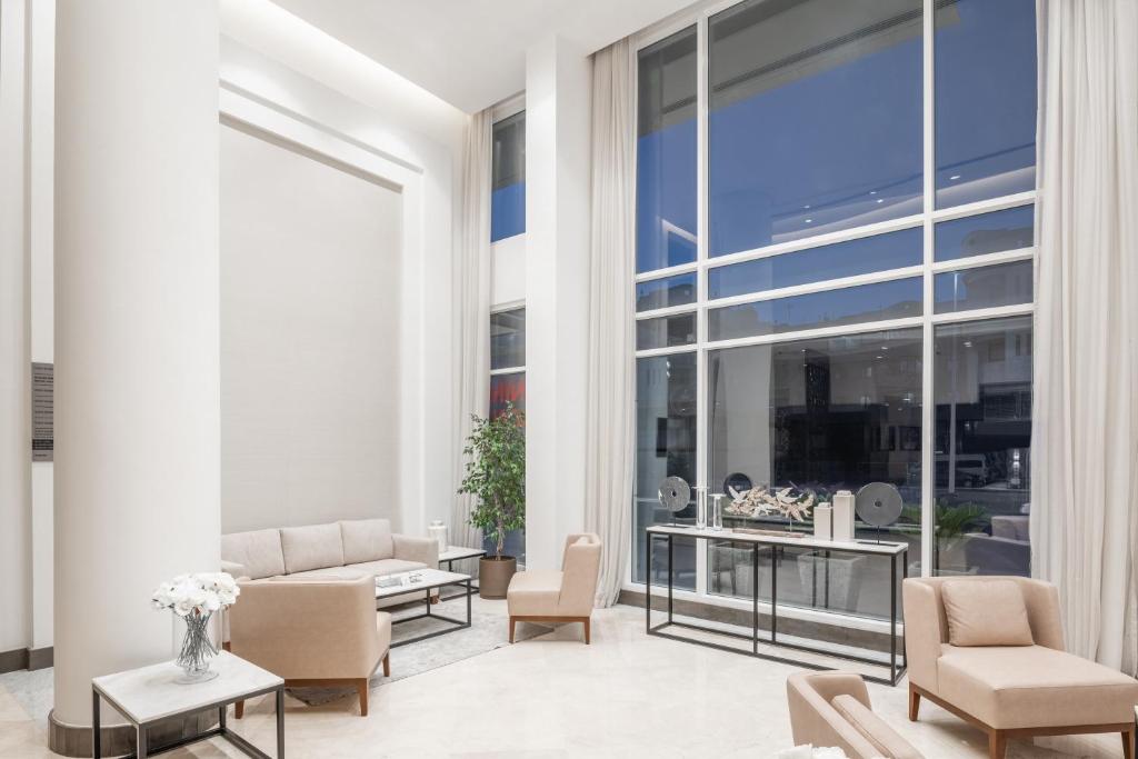 Posezení v ubytování Landmark Hotel & Suites فندق وأجنحة لاندمارك