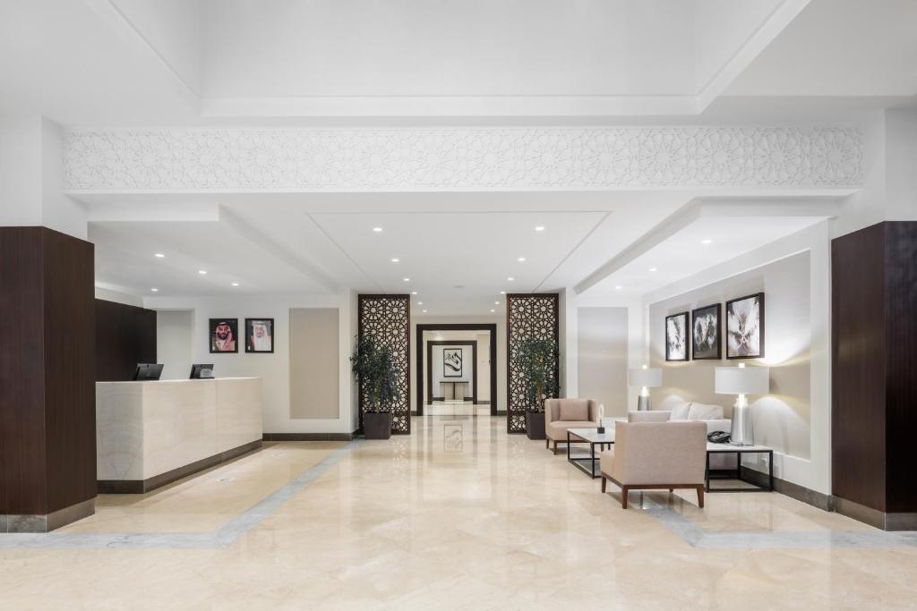 Posezení v ubytování Landmark Hotel & Suites فندق وأجنحة لاندمارك