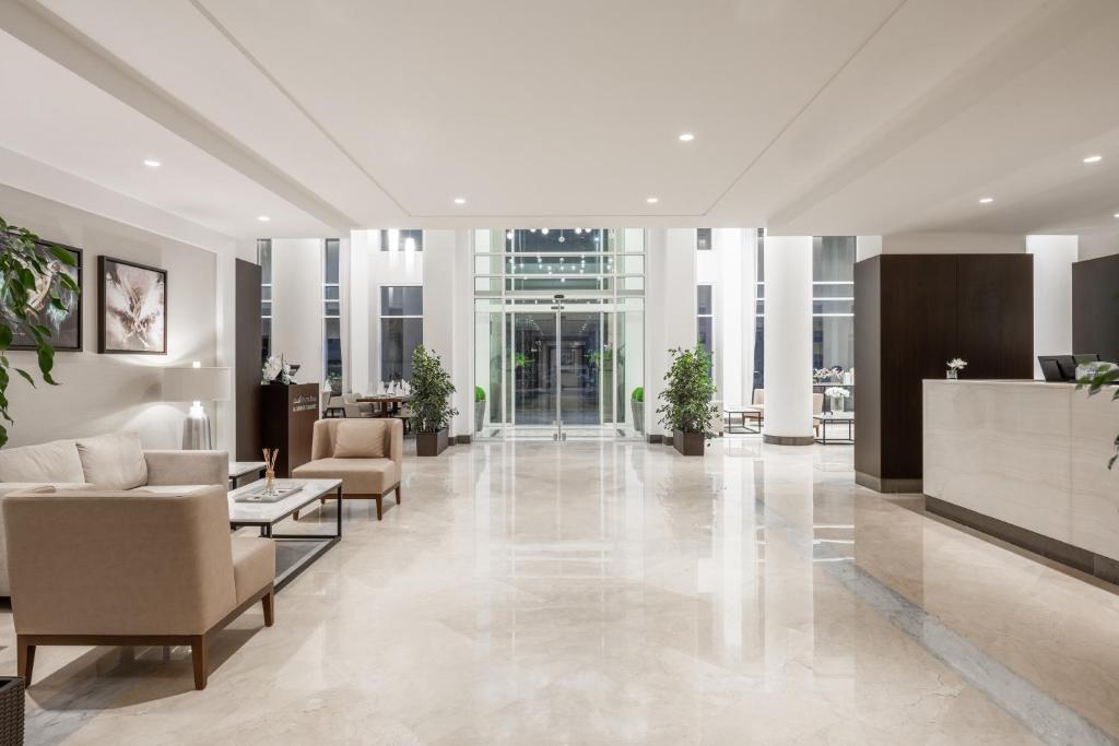 Posezení v ubytování Landmark Hotel & Suites فندق وأجنحة لاندمارك