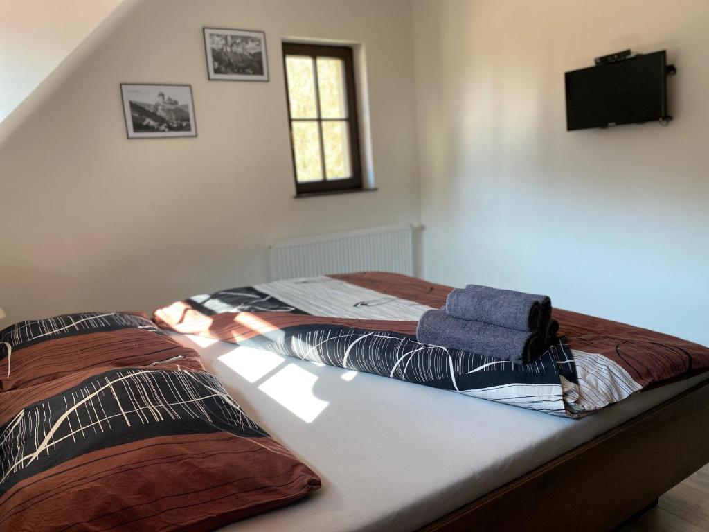 Postel nebo postele na pokoji v ubytování Penzion U Adama