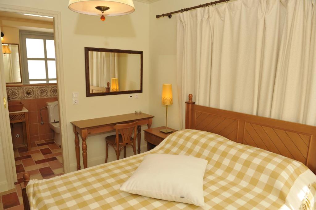Postel nebo postele na pokoji v ubytování Gaia accomodation Hydras