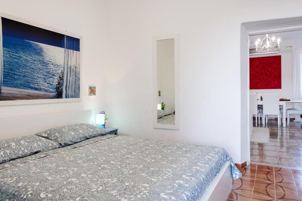 Кровать или кровати в номере Le Viole Matte - Appartamento immerso nel Verde con Vista Mare