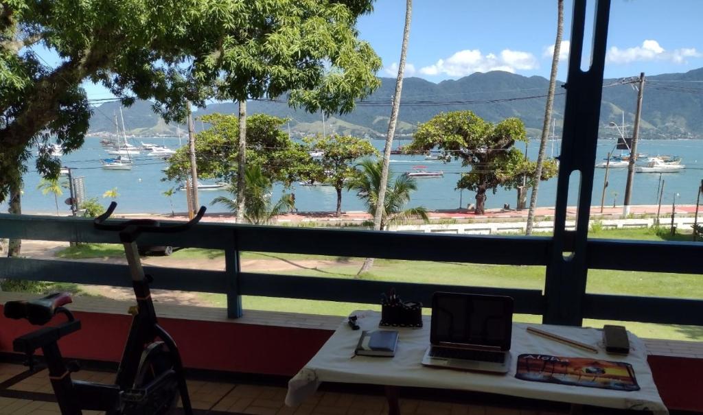  ALOHA em frente a praia- Suítes privativas & hostel
