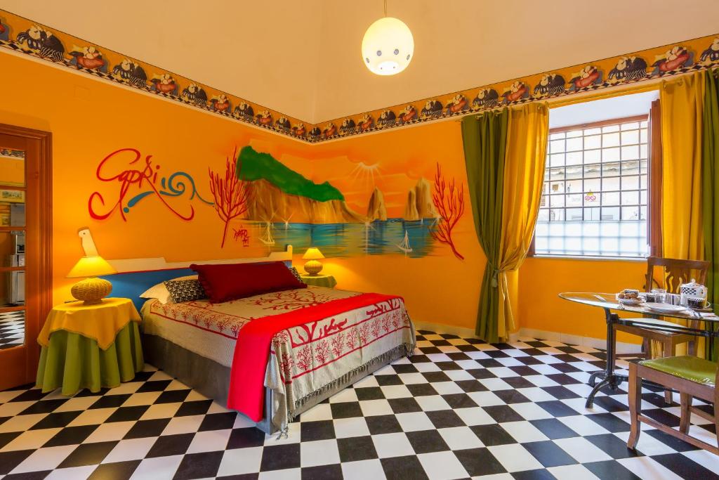 Postel nebo postele na pokoji v ubytování Orchid Corner Guesthouse