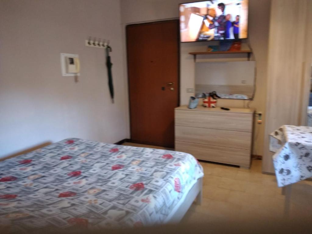 Posteľ alebo postele v izbe v ubytovaní Appartamento Picasso