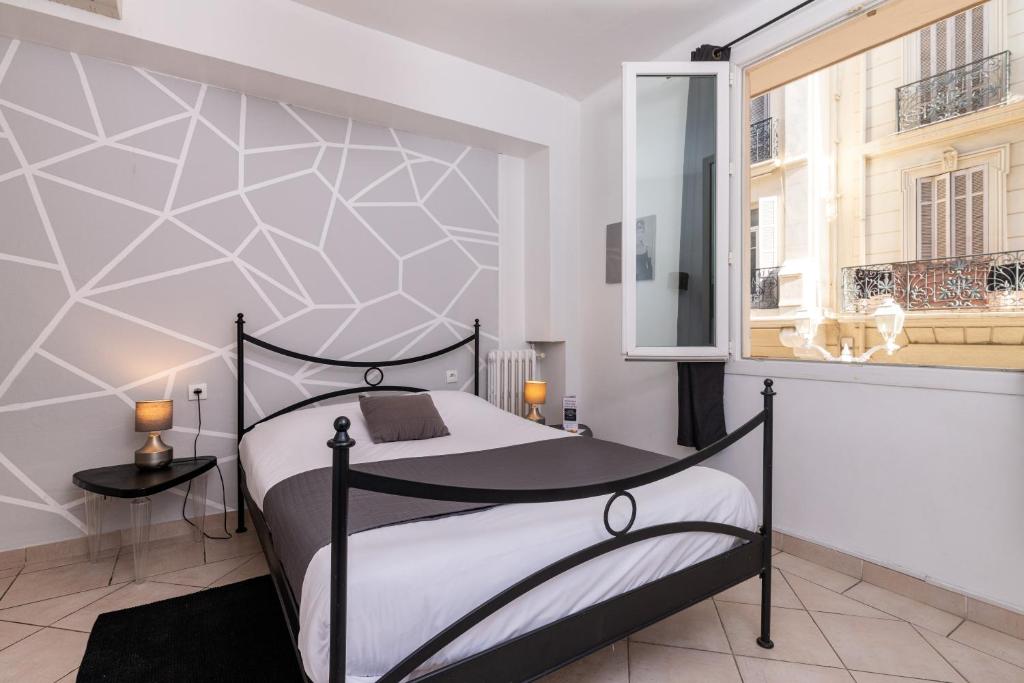 Postel nebo postele na pokoji v ubytování Celenya Hôtel
