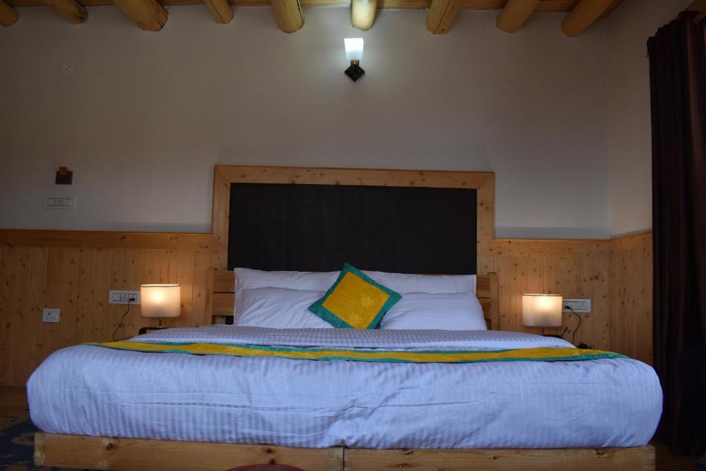 Postel nebo postele na pokoji v ubytování Namra Villa