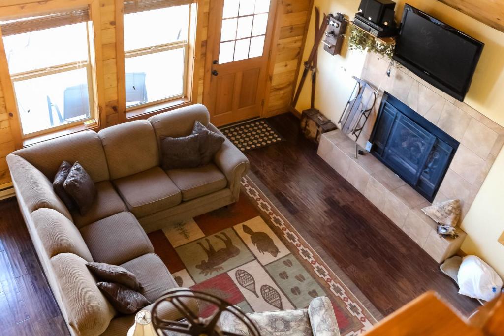 an overhead view of a living room with a couch and a fireplace at Timberline Vista in Cripple Creek